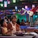 Musicians and dancers performing onstage while Guests dine at Plaza de Coco on the Disney Treasure